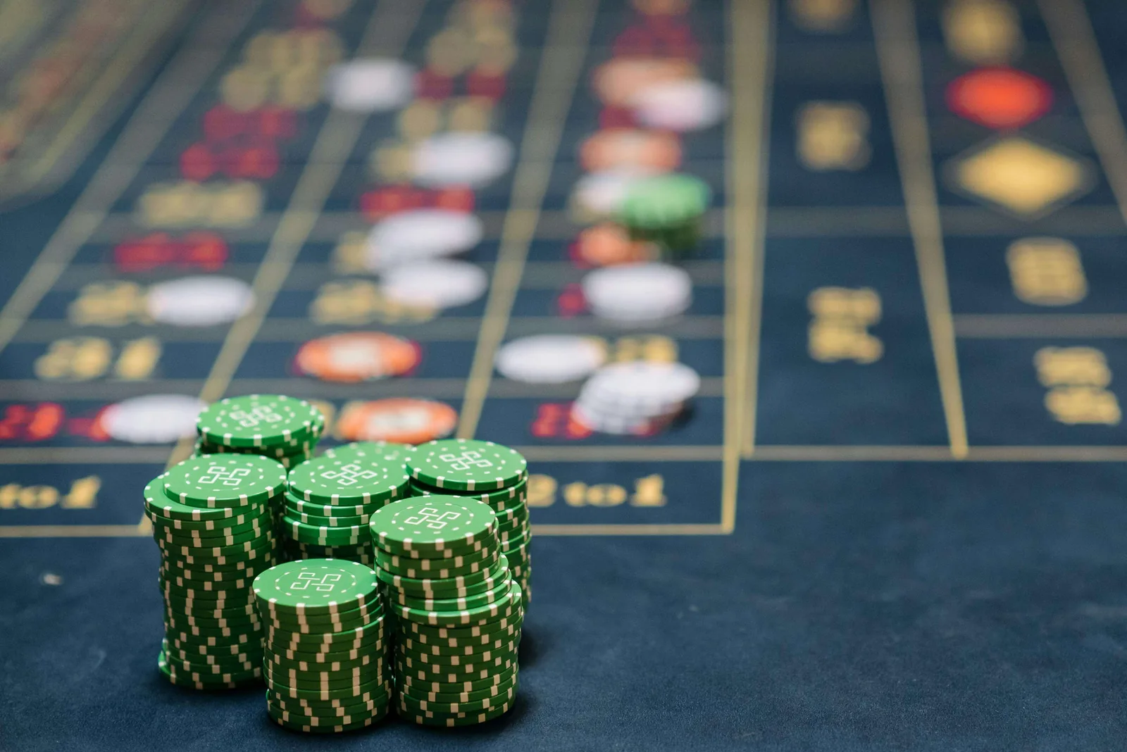 Green chips on a navy Velvetine roulette layout printed by Casino Supply UK
